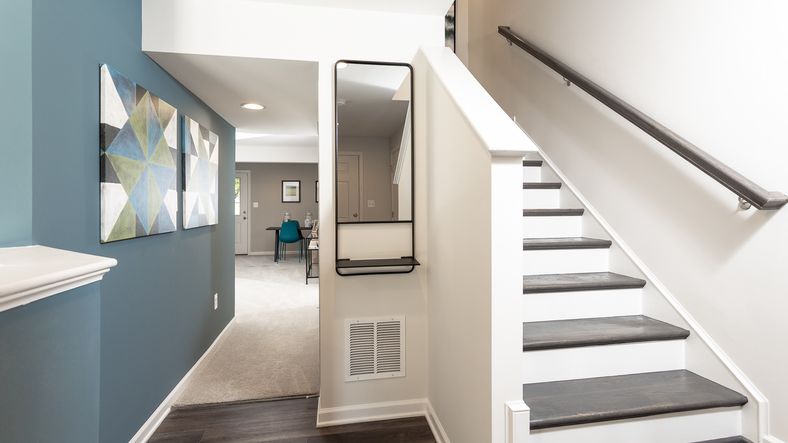 The lower-level entrance in the York II features stairs to the second floor and a flex room.