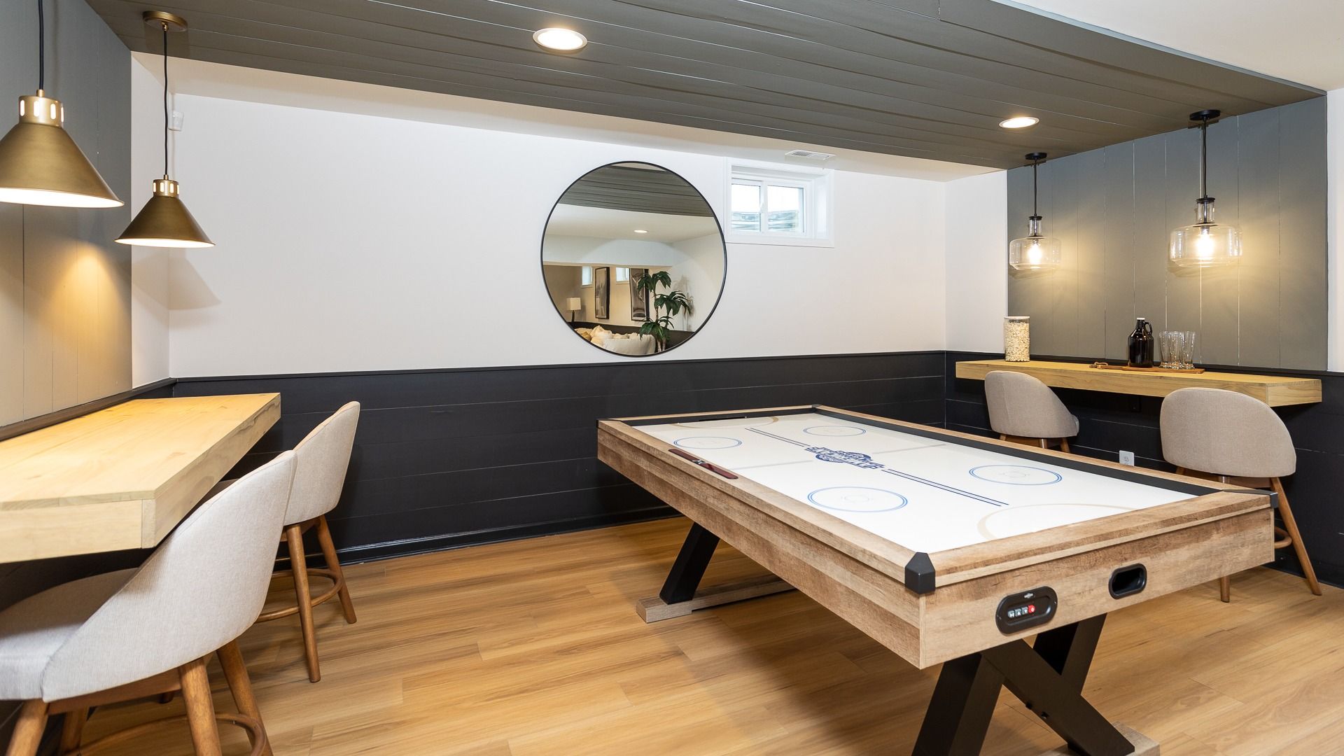 The game room in the Regent II floor plan provides a spacious area for entertainment and activities.