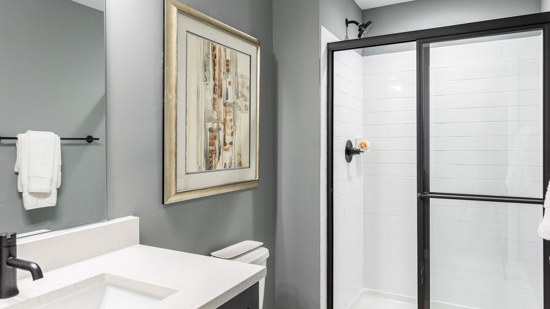 The lower level bath in the Regent II floor plan features a shower and sink vanity.