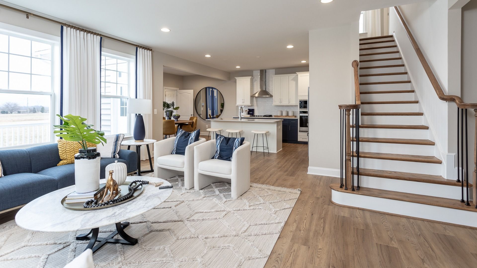 Comfortable living room with eye catching accents in the Clemson II floor plan.