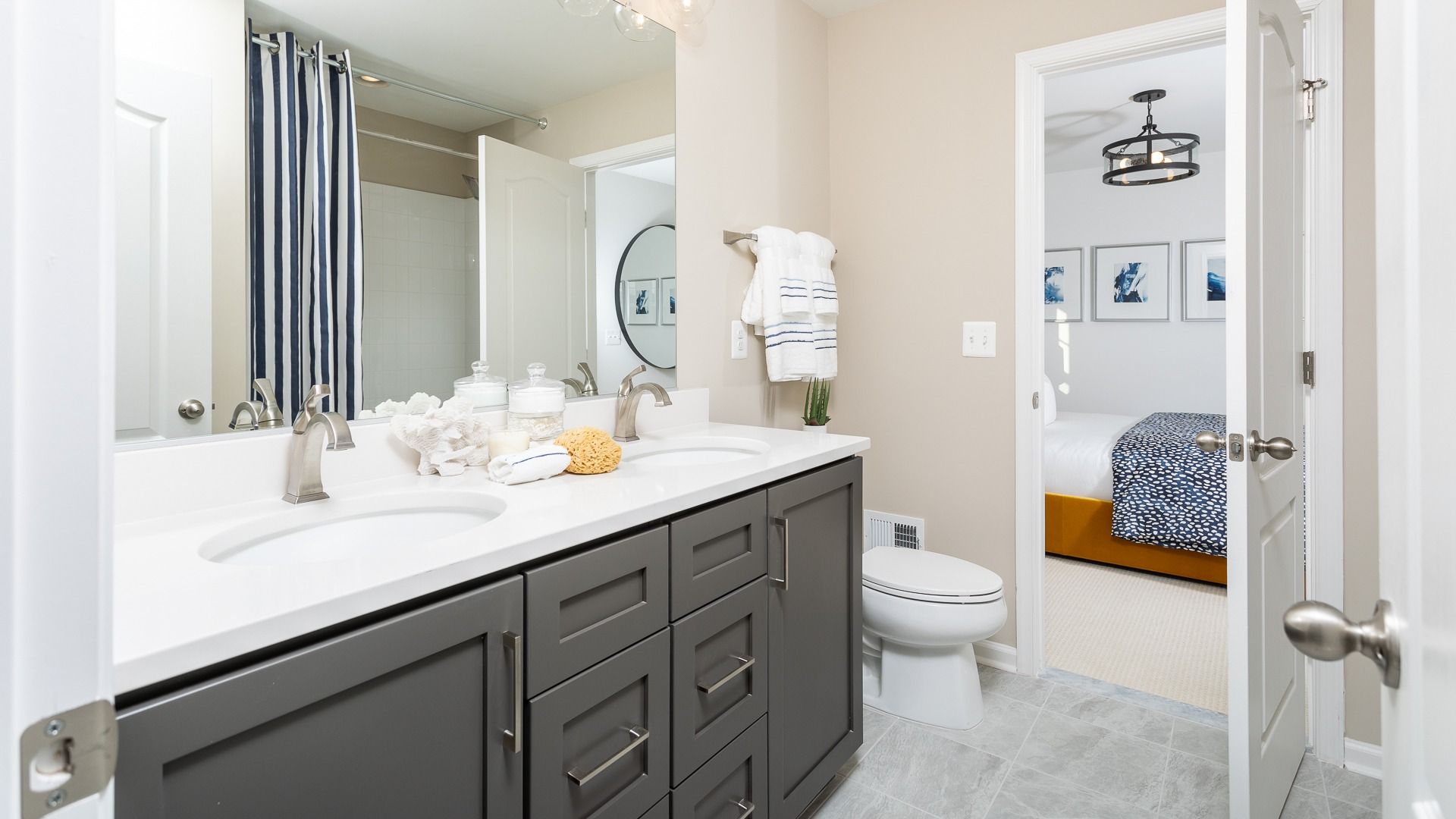 Full bath with double sink vanity and sleek features in the Clemson II floor plan.