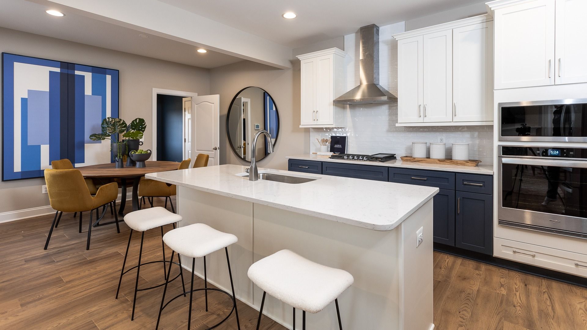 Bright and open kitchen with large center island and seating in Clemson II floor plan.