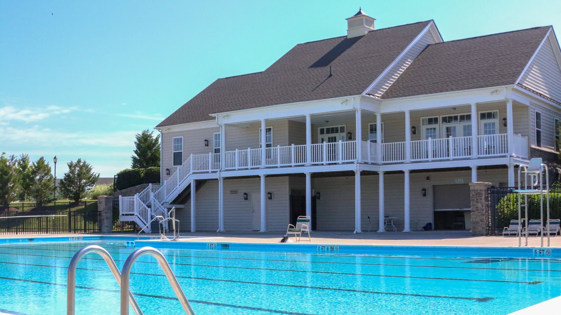 The neighborhood pool and clubhouse, perfect for recreation and gatherings.