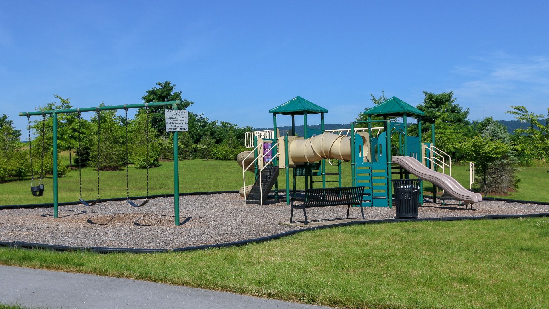 The community playground is the perfect spot for kids to play and enjoy outdoor fun.