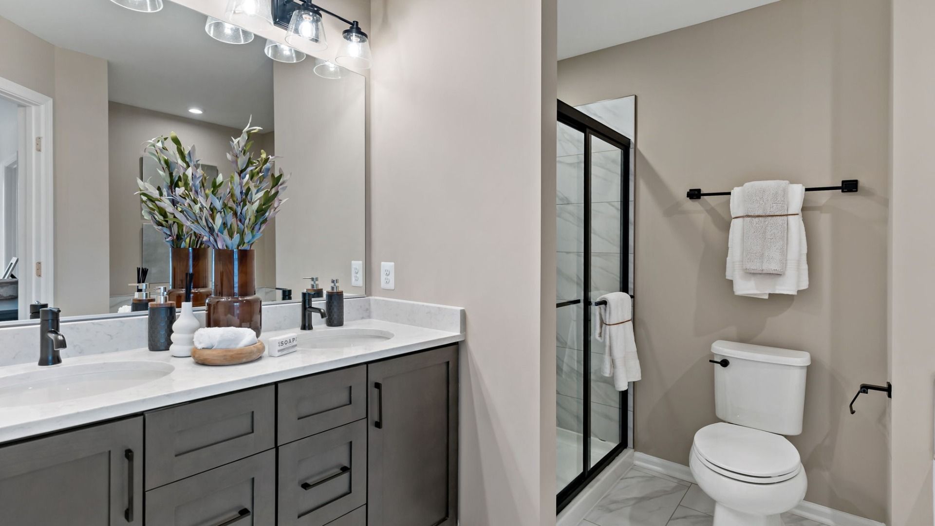 Owner's bathroom in a York II South Brook Townhome by DRB Homes, showcasing modern fixtures and finishes in Inwood, WV.