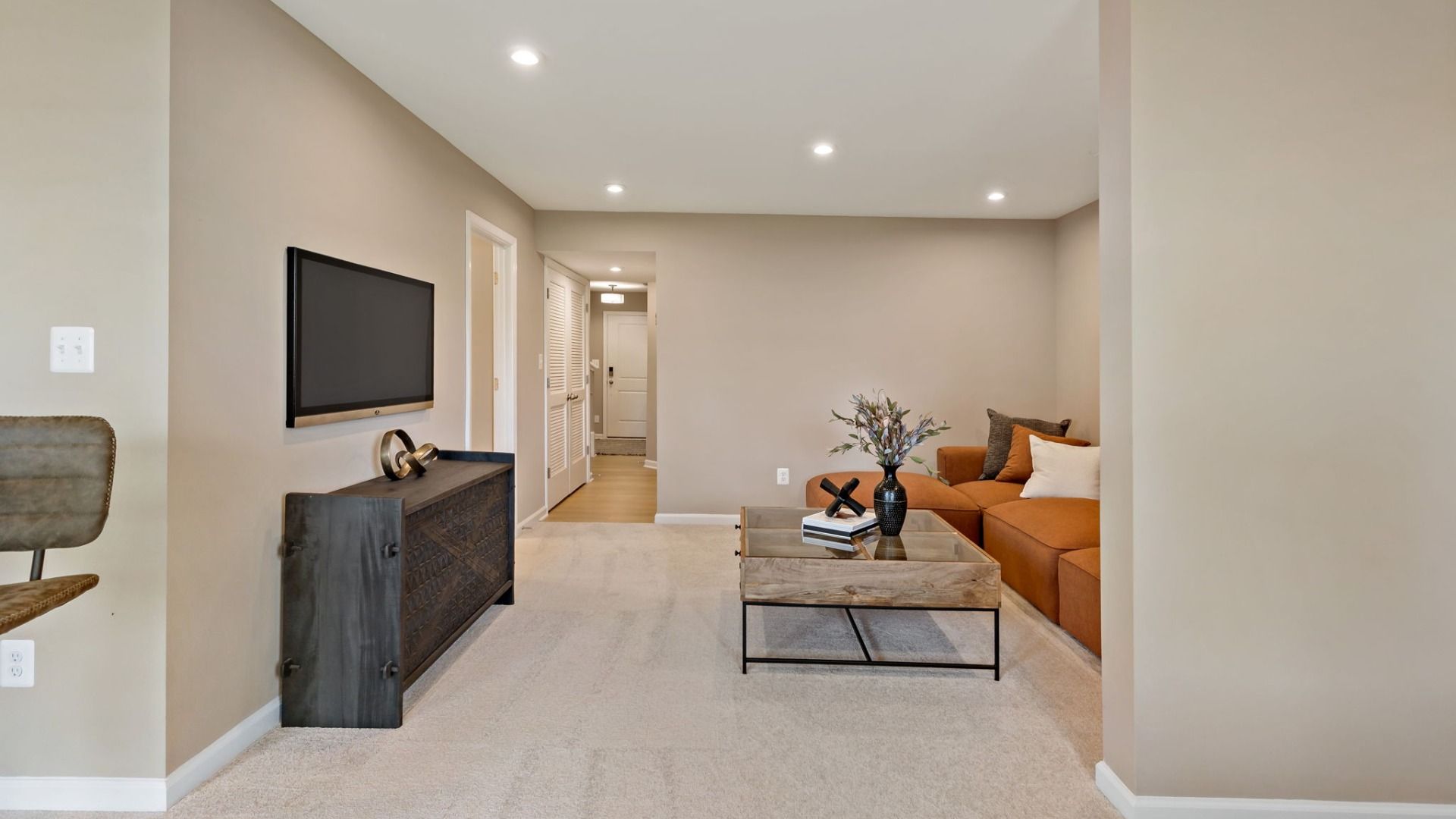 Spacious Lower-Level living room in a York II South Brook Townhome by DRB Homes, featuring modern decor in Inwood, WV.
