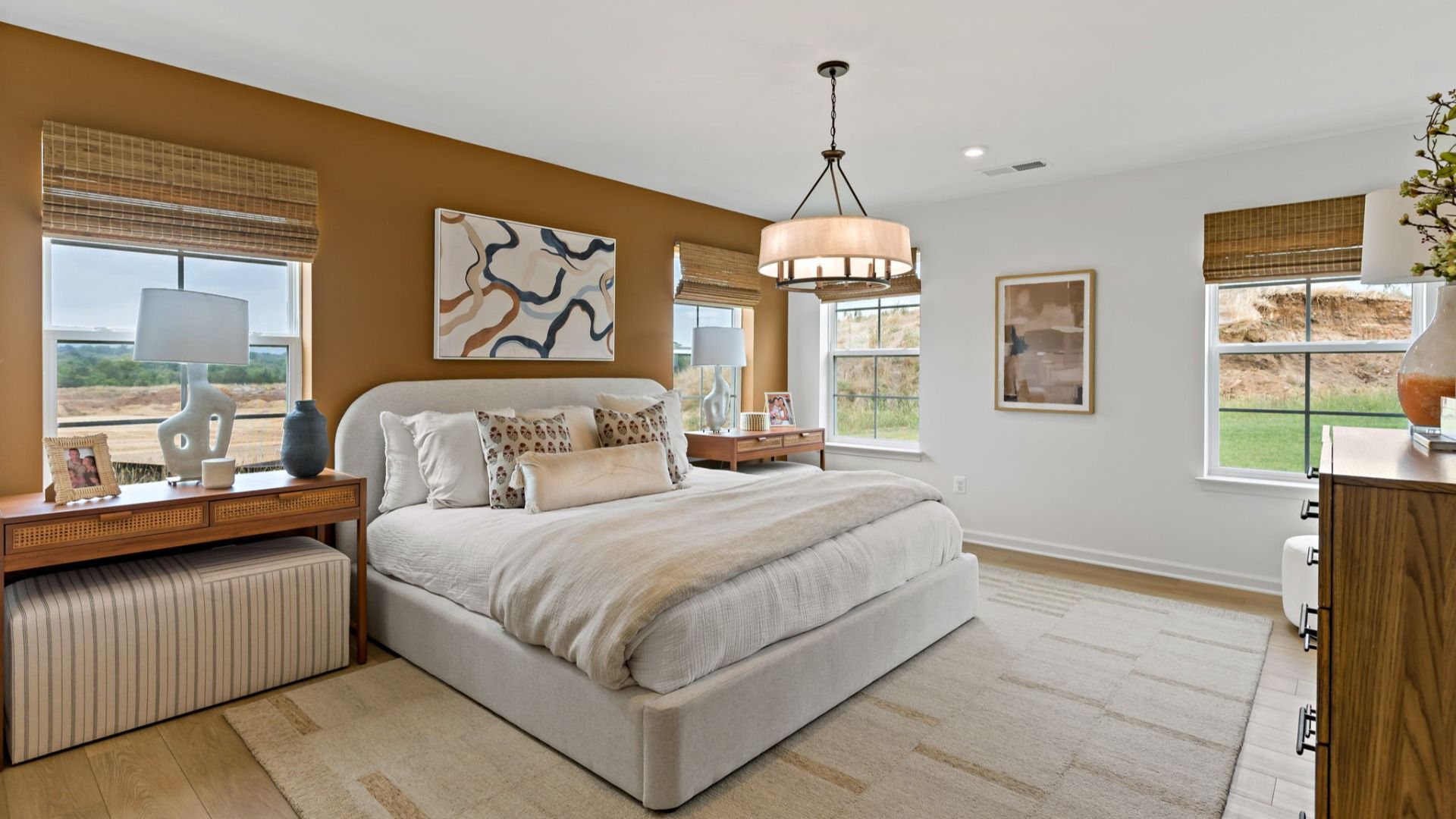Spacious owner's bedroom in a South Brook home, Inwood, WV, showcasing elegant design and a relaxing atmosphere.