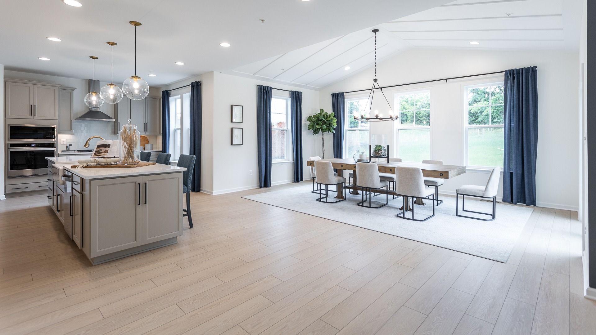The spacious kitchen and bright morning room of the Oakdale II floor plan.