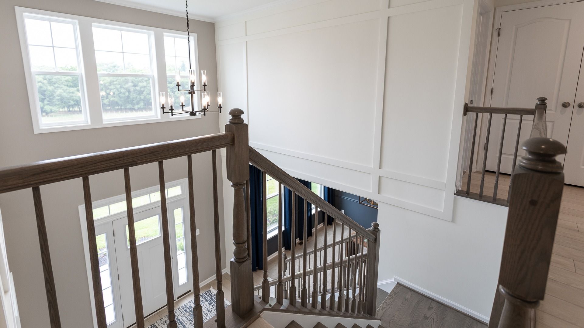 The Oakdale II foyer, where elegant design meets open-air views across the striking second floor.