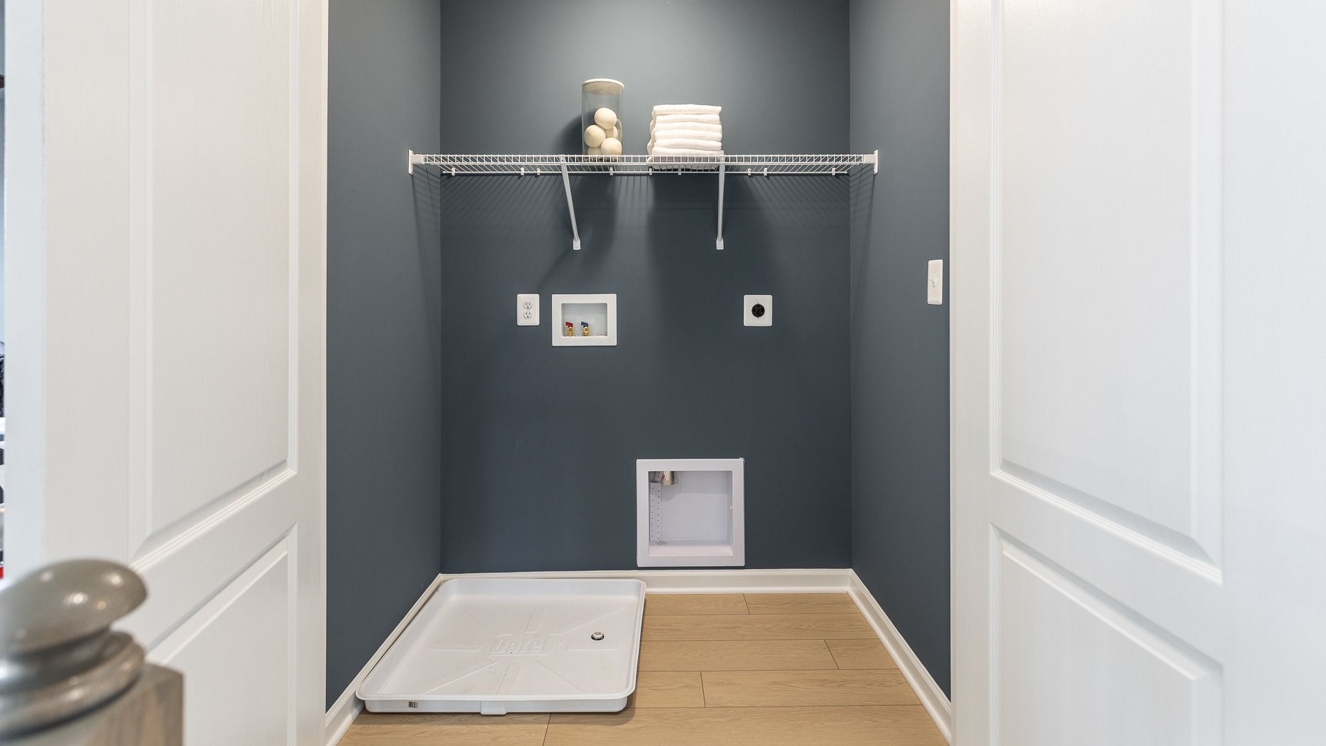The Oakdale II's thoughtfully designed 2nd floor laundry room streamlines everyday efficiency.
