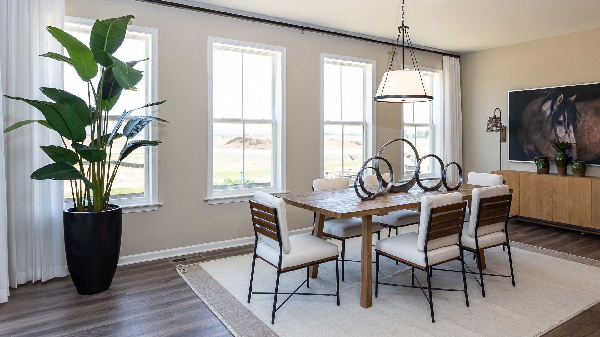 Morning room with wall of 4 windows in a DRB Homes Castlerock II home plan at Huntfield