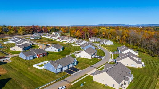 Drone view of Rosehill Manor in Hagerstown, MD, showcasing the neighborhood and vibrant fall foliage.