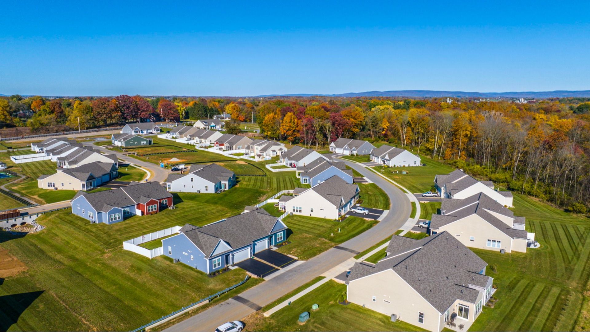 Drone view of Rosehill Manor in Hagerstown, MD, showcasing the neighborhood and vibrant fall foliage.