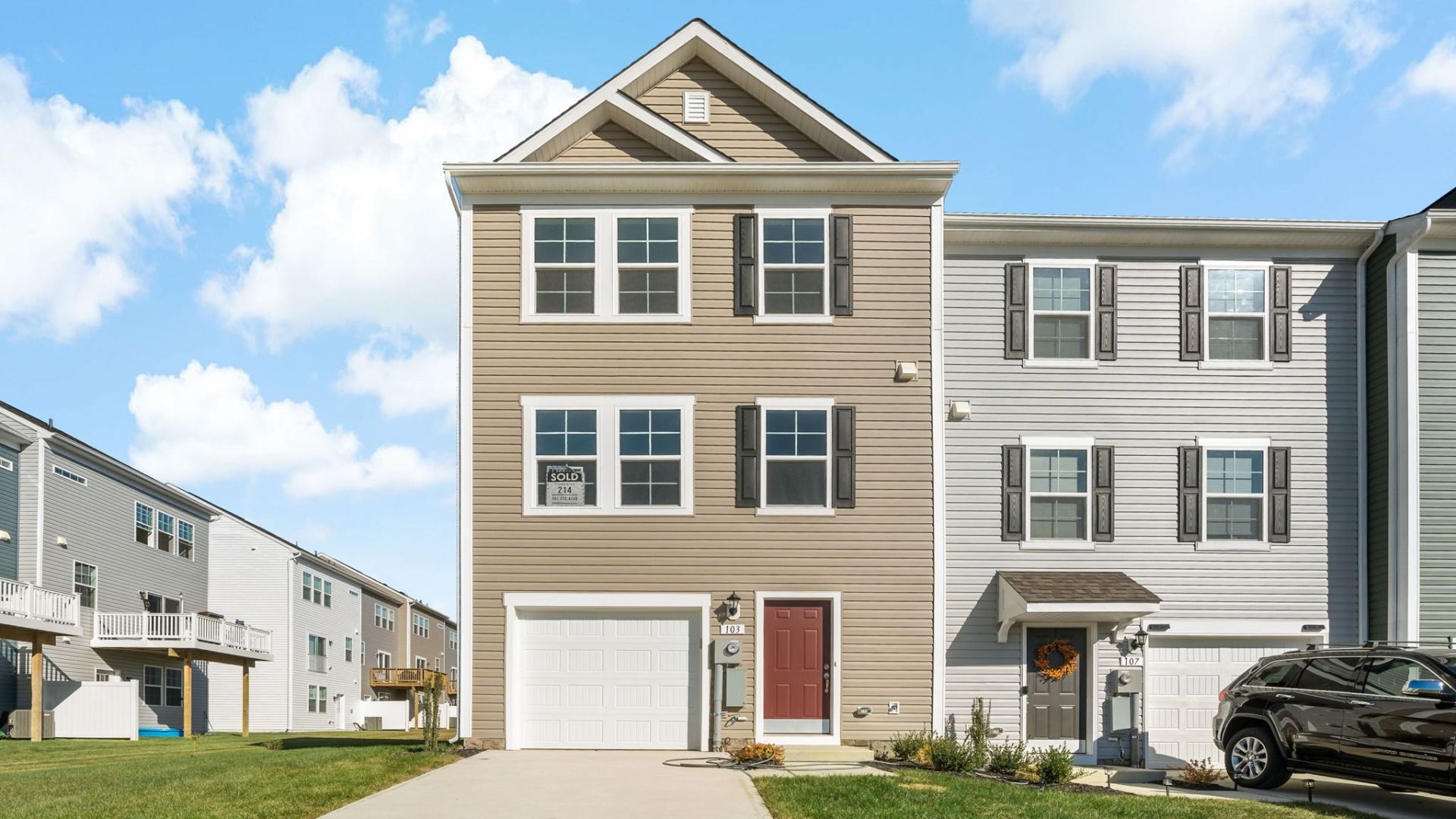 Front exterior view of York II floor plan at Kings Crossing Townhomes by DRB Homes, located in Charles Town, West Virginia.