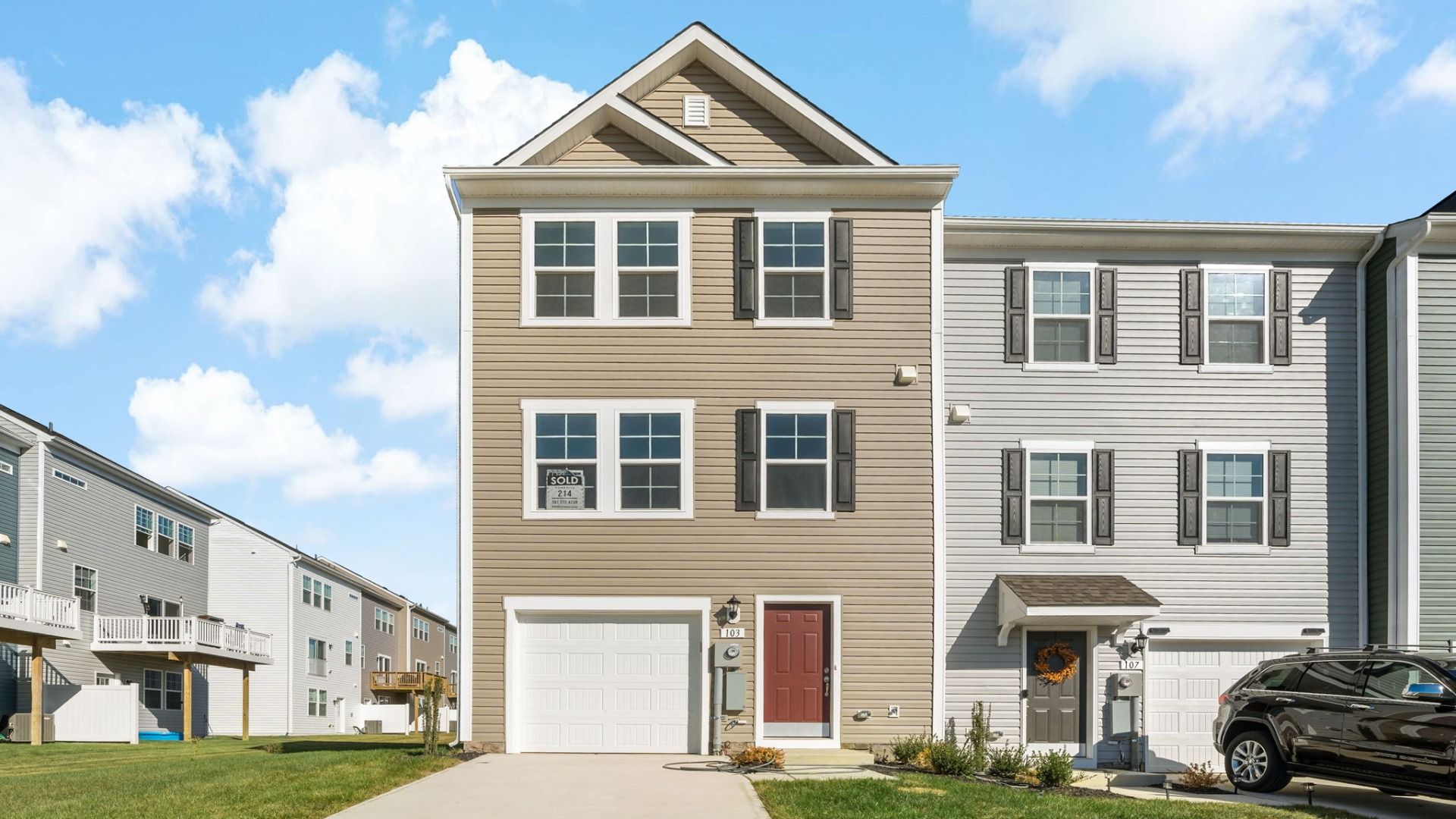 Front exterior view of the York II floor plan at South Brook Townhomes by DRB Homes, located in Inwood, West Virginia.