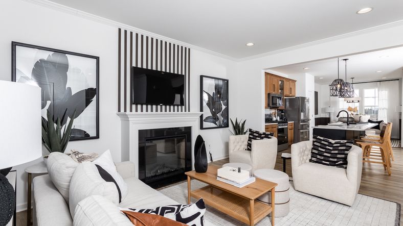 The living room in the Bedford II floor plan offers modern design and cozy seating.