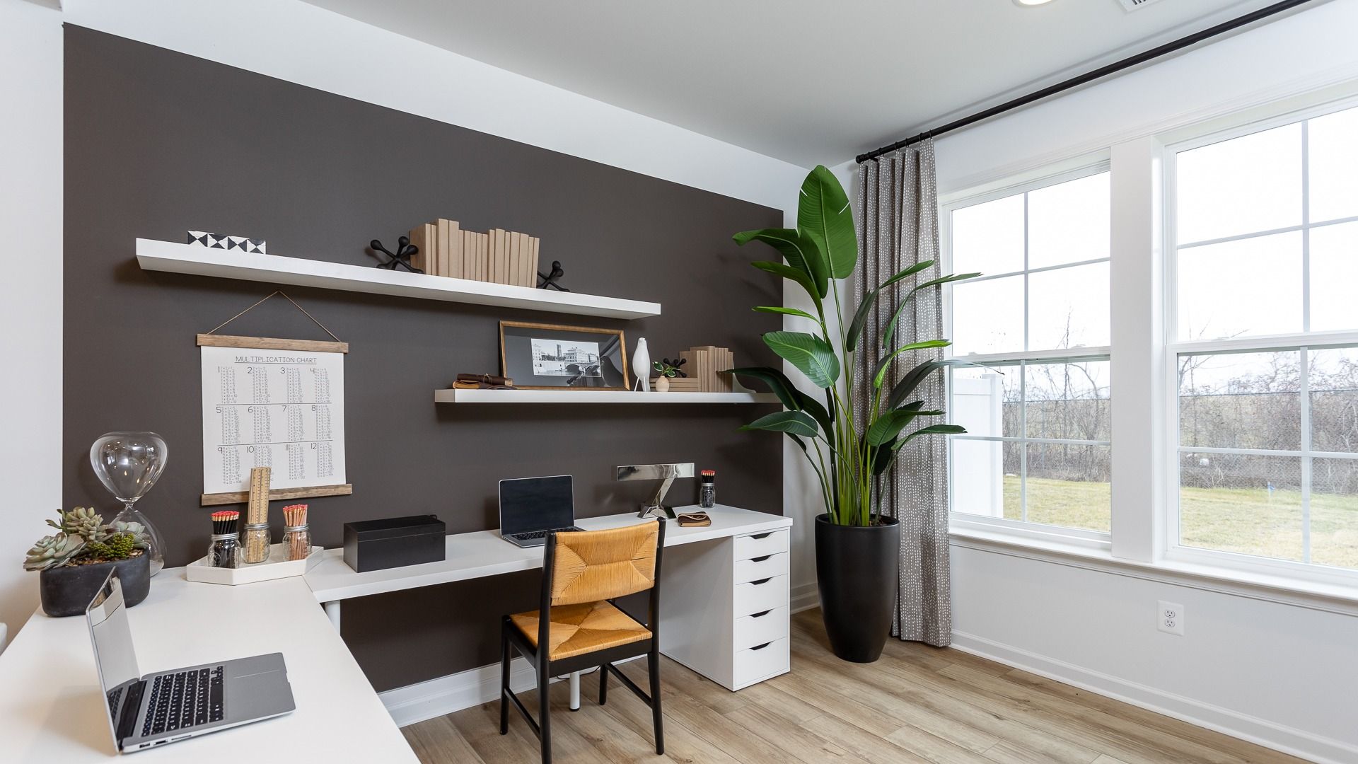 Get productive in the dedicated study space with a large L-shaped desk in the Bedford II floor plan.