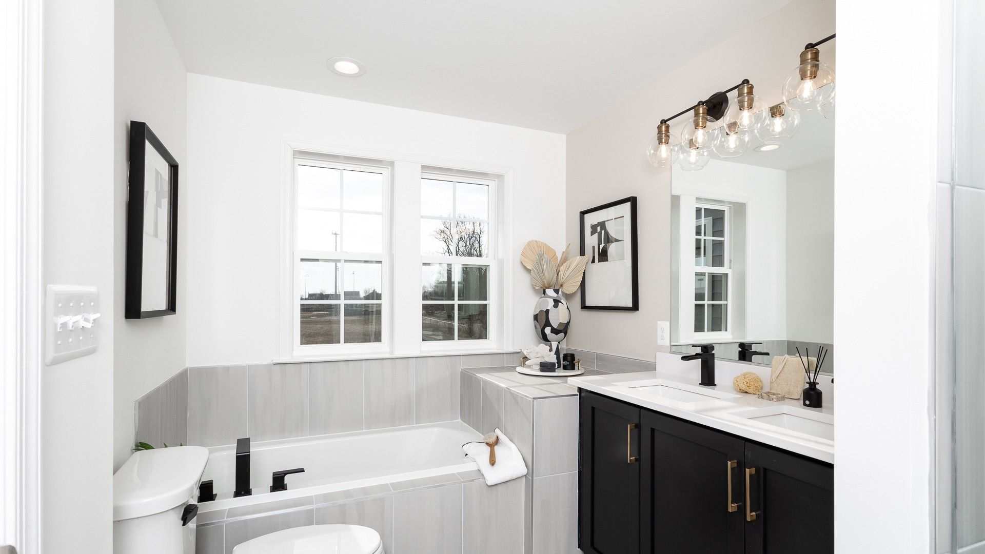 The owner's bath with soaking tub and dual sink vanity in Bedford II floor plan.