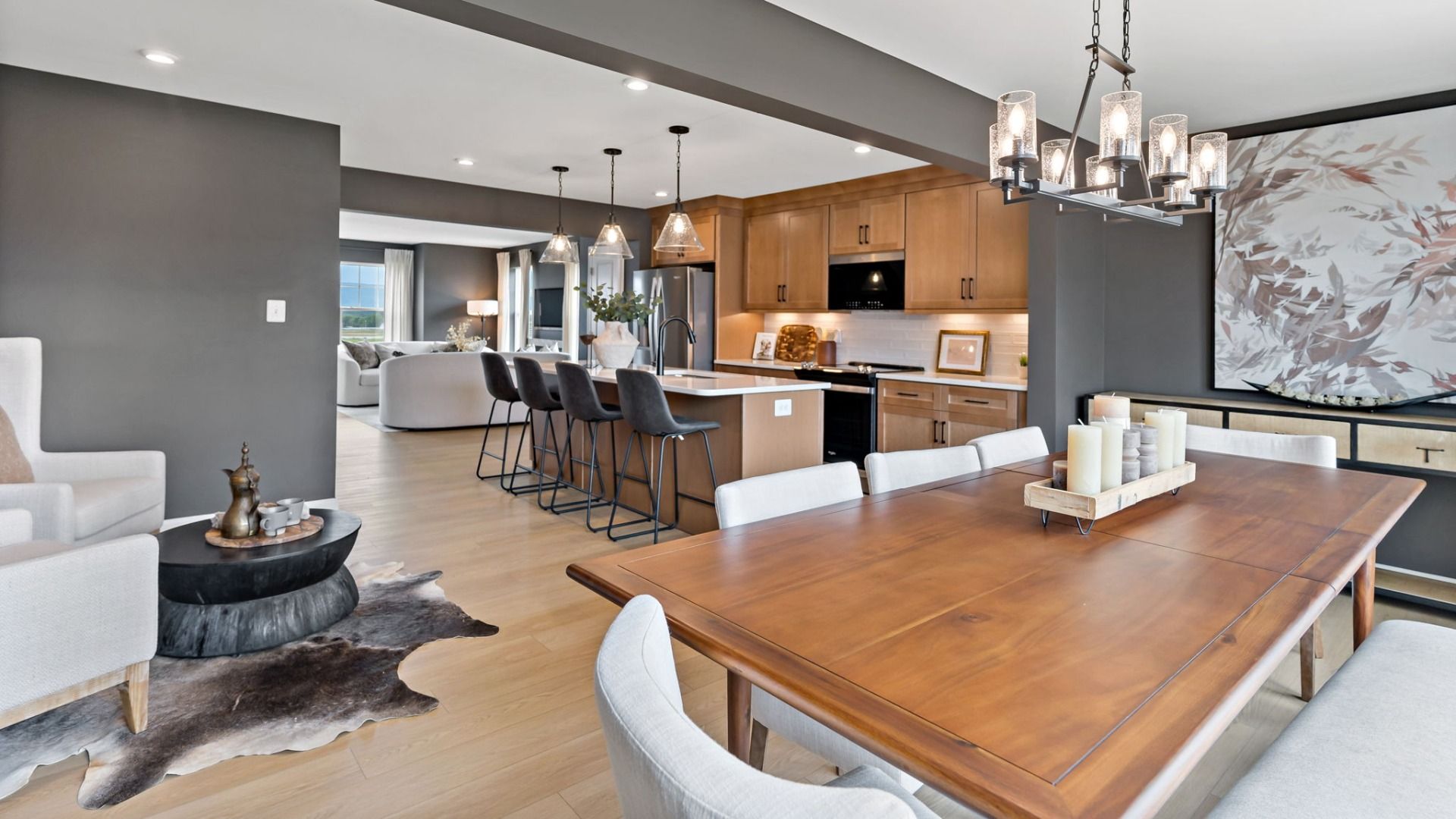 Bright first-floor sunroom with spacious country kitchen in the York II townhome plan.