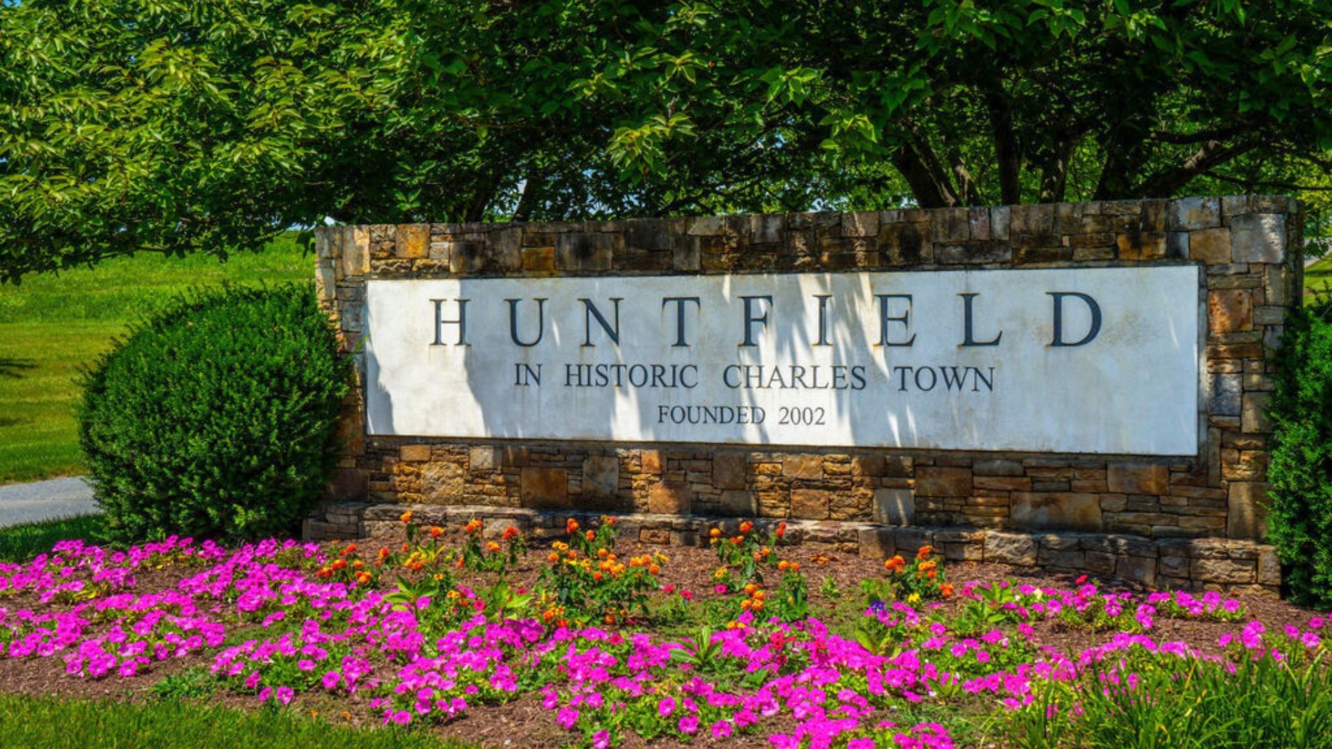 Entrance monument to Huntfield in historic Charles Town, WV, welcomes with style and charm.
