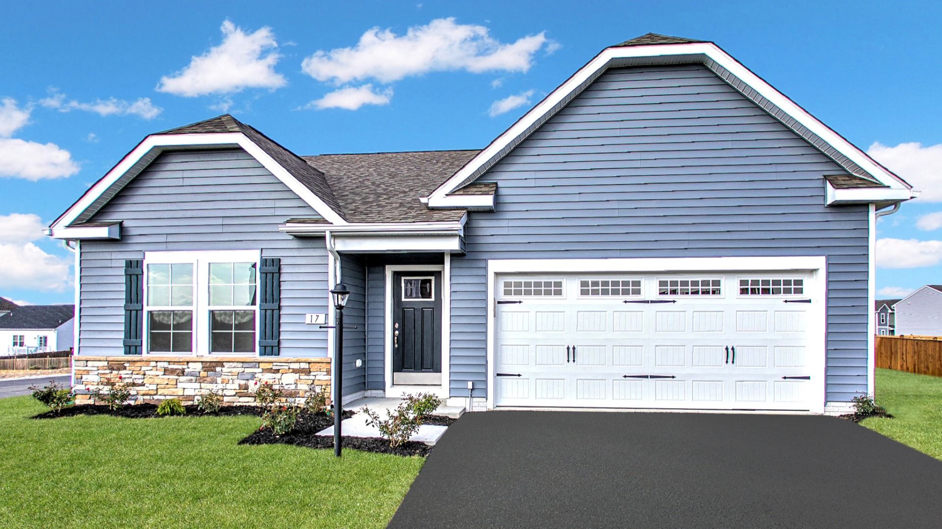 The Edgewood II exterior blends modern design with classic charm in this stylish one-level home.