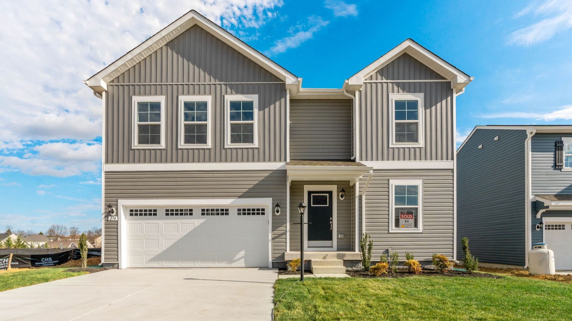 Carnegie II home plan exterior with added elevation 2 at the DRB Homes Community Stony Run Village.