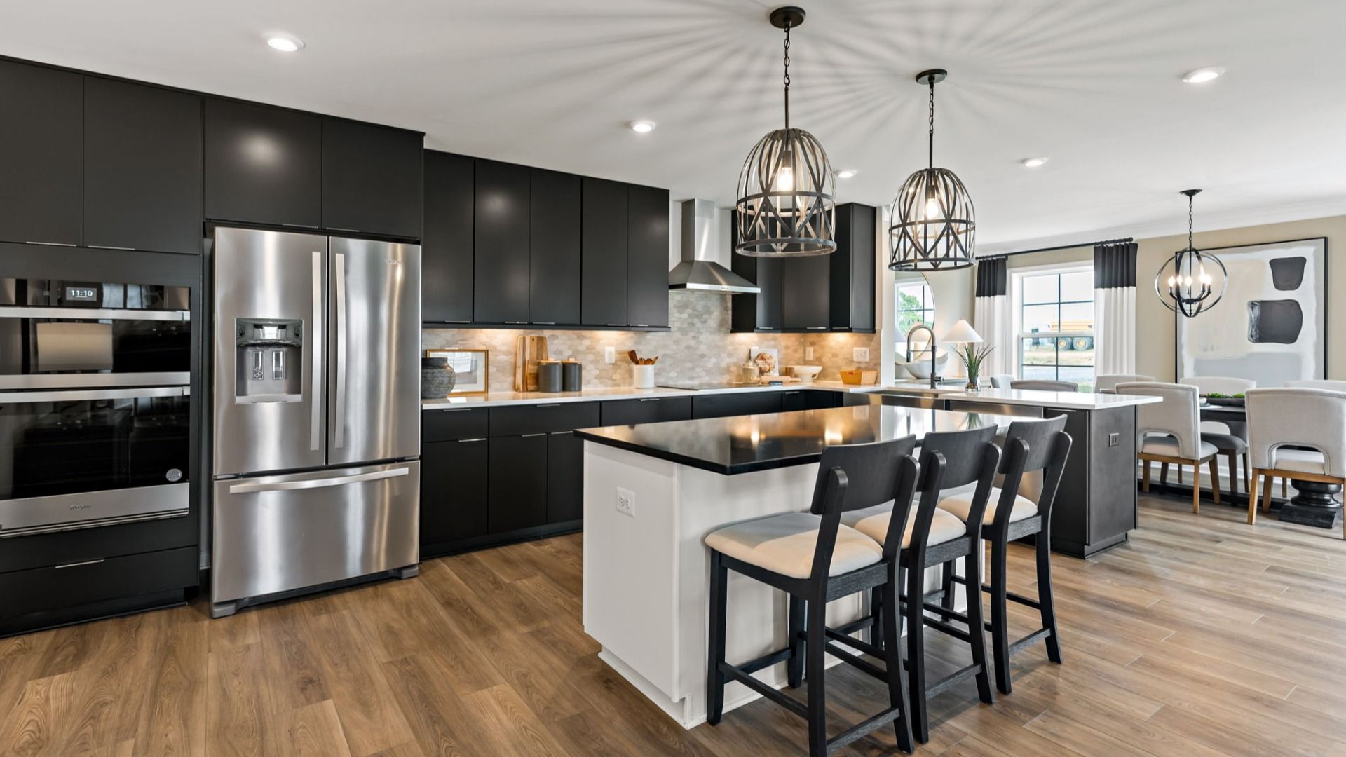The kitchen in the Carnegie II floor plan is sleek, stylish, and functional, with a spacious island.