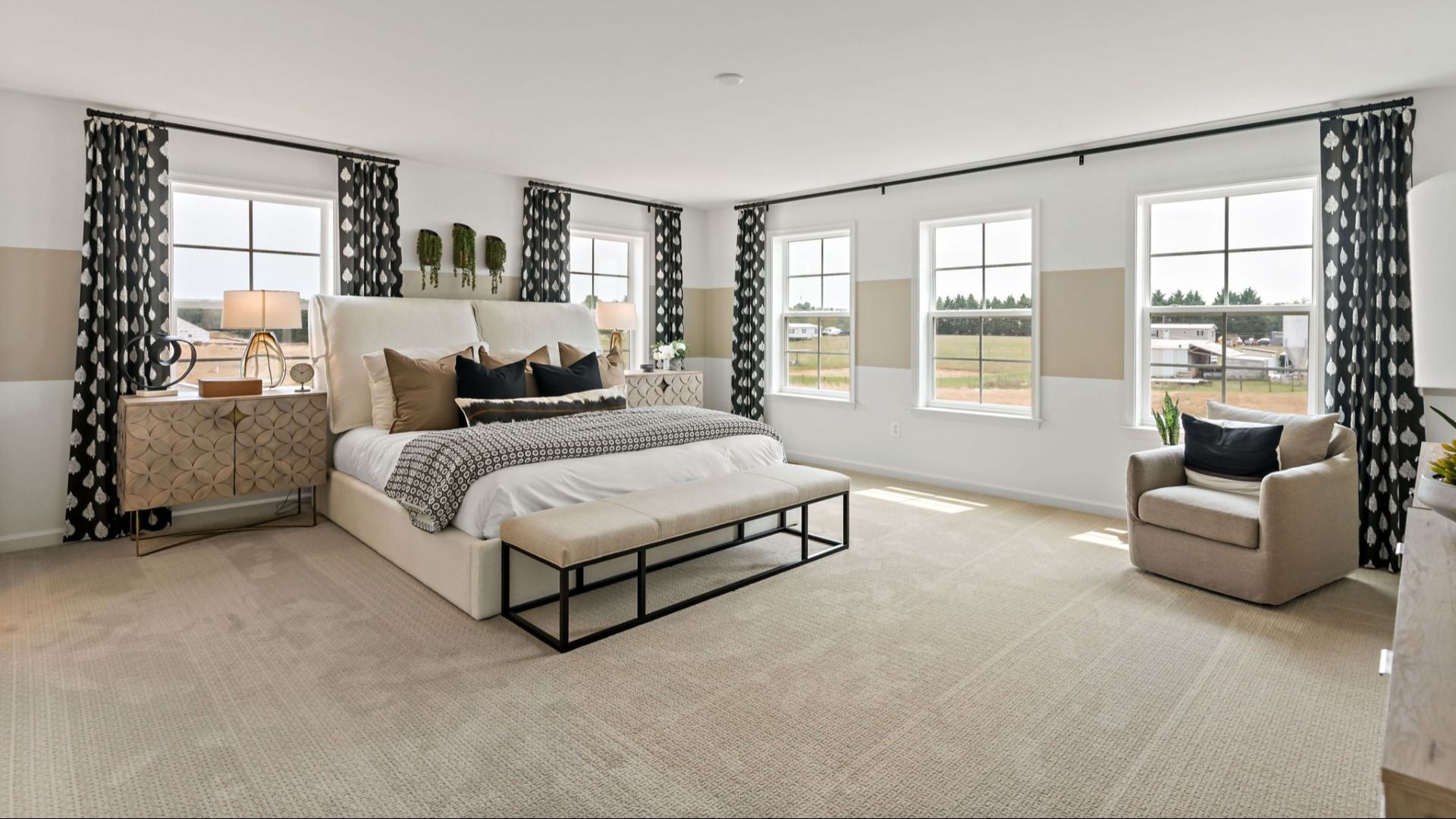 The primary suite in the Edgewood II is designed for luxury and comfort with elegant finishes.