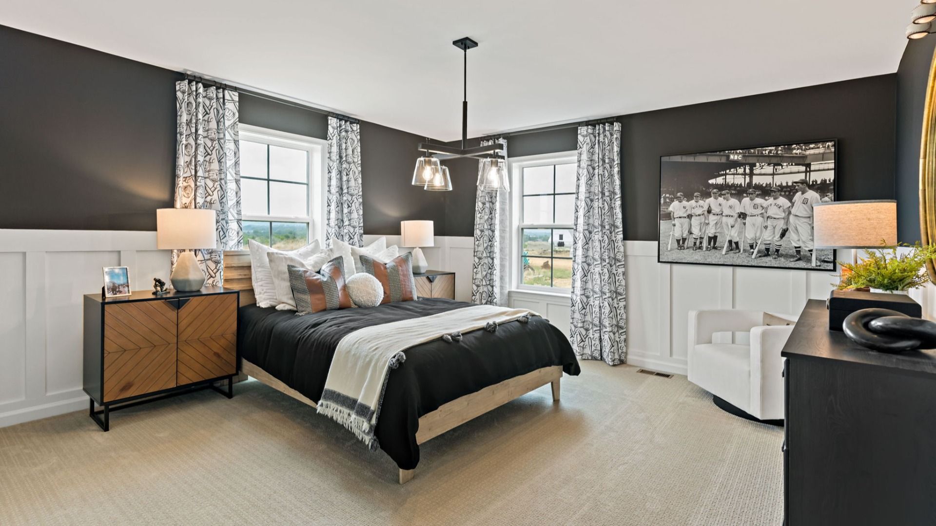 The Carnegie II floor plan features a primary suite with elegant details and a stylish design.