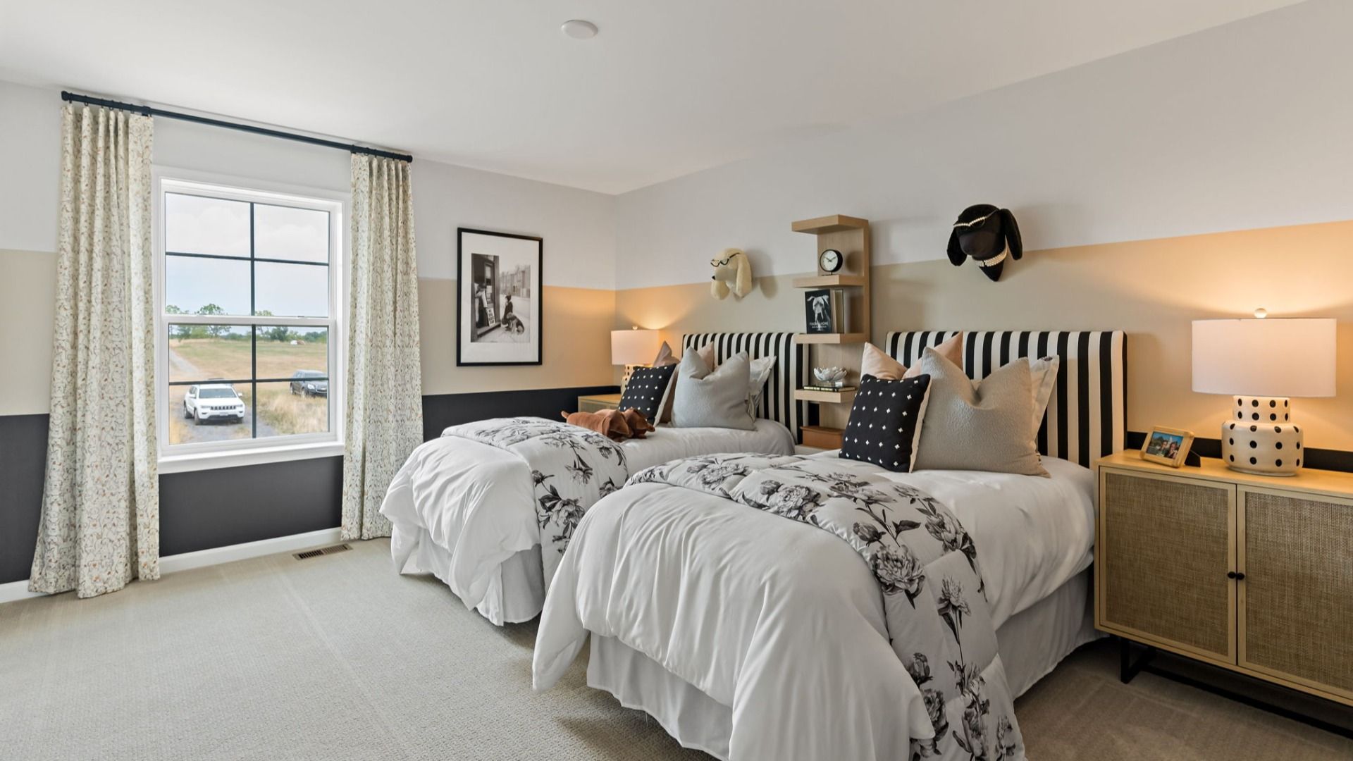 A bedroom in the Carnegie II can make the perfect twin room with stylish patterns and warm neutrals.