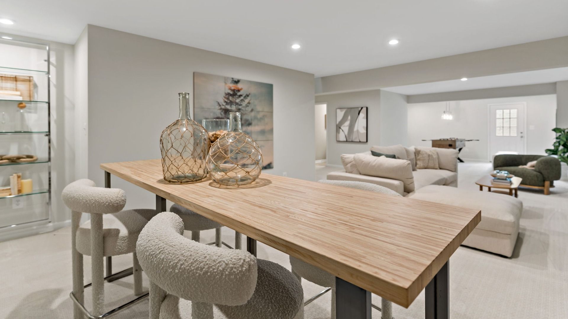 Relax and entertain in style with the Whitehall II lower-level lounge with bar seating.