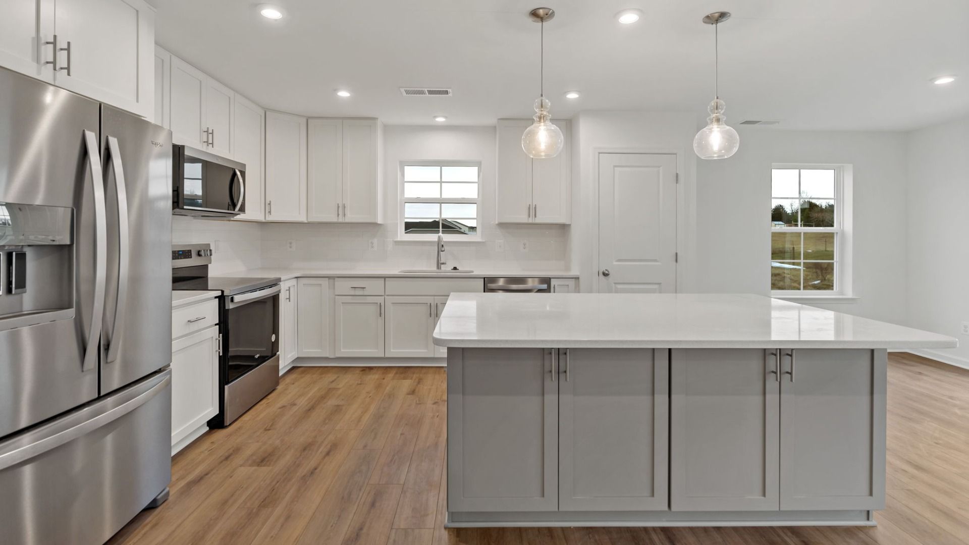 A fresh, modern kitchen in the Edgewood II floor plan with sleek finishes and ample space.