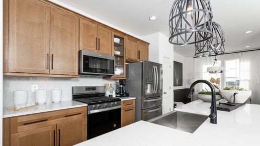 The kitchen in the Bedford II floor plan at Valor Crossing is perfect for cooking and entertaining.