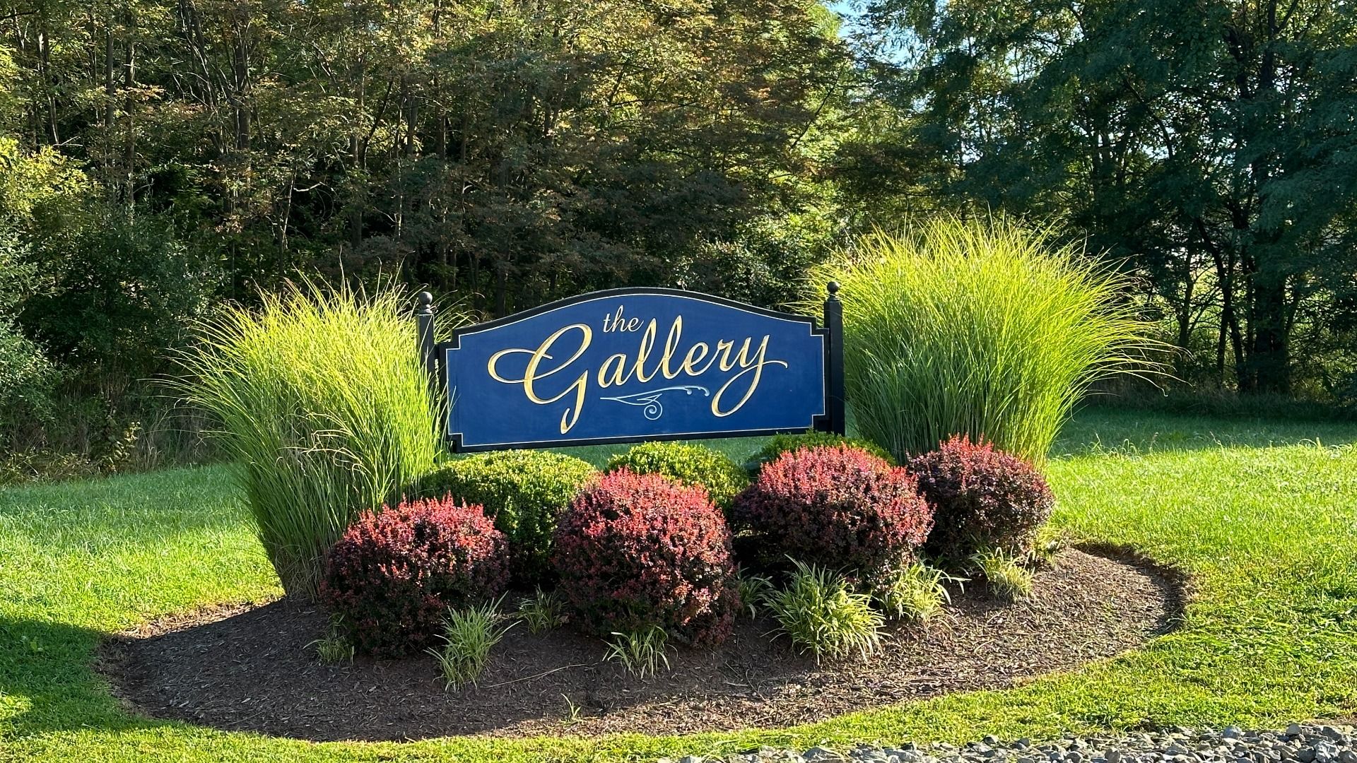 The Gallery monument sign at the Apple Harvest Drive entrance, welcoming residents and visitors.