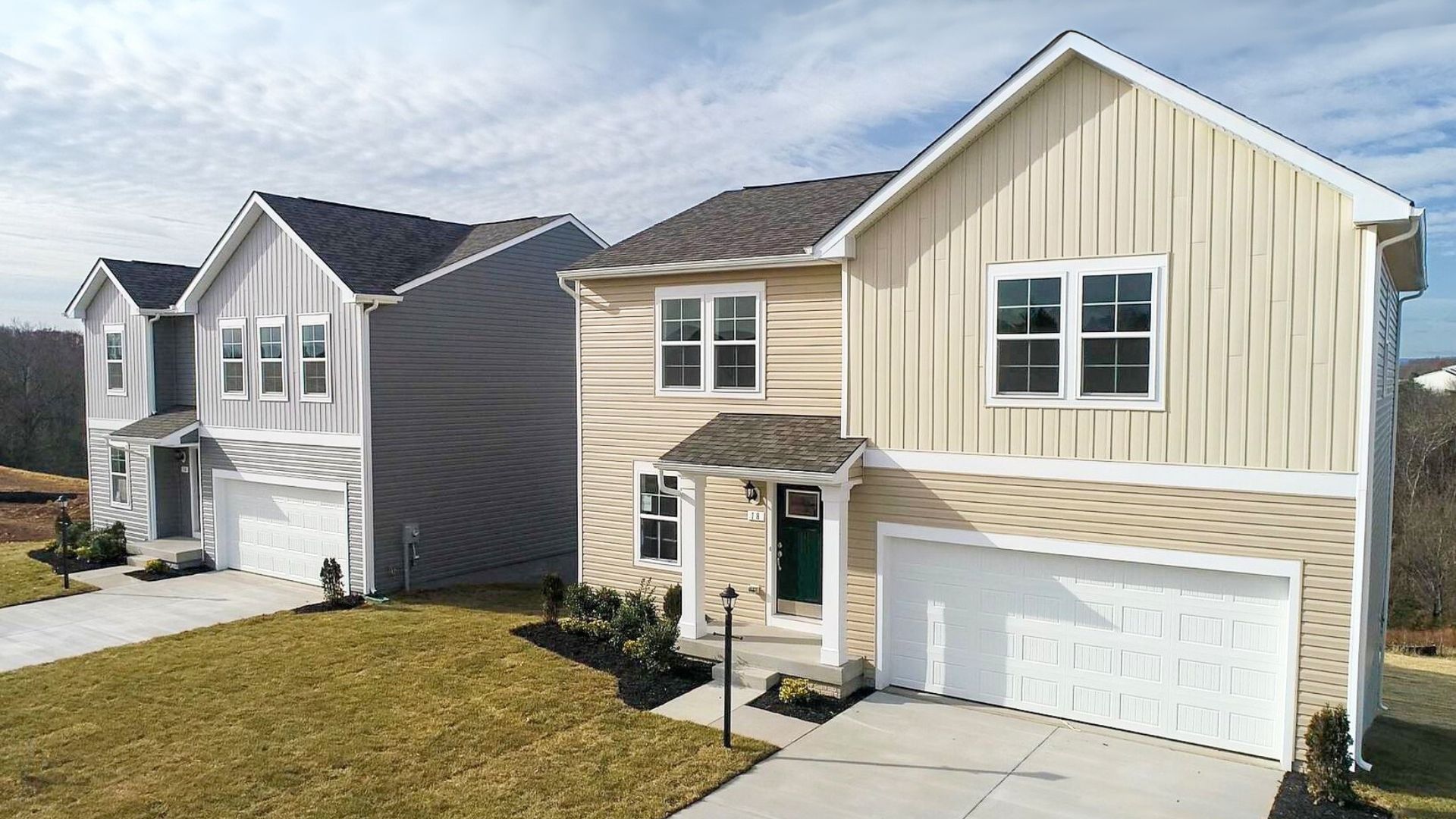 Carnegie II and Whitehall II floor plans with elevation 2 exteriors.