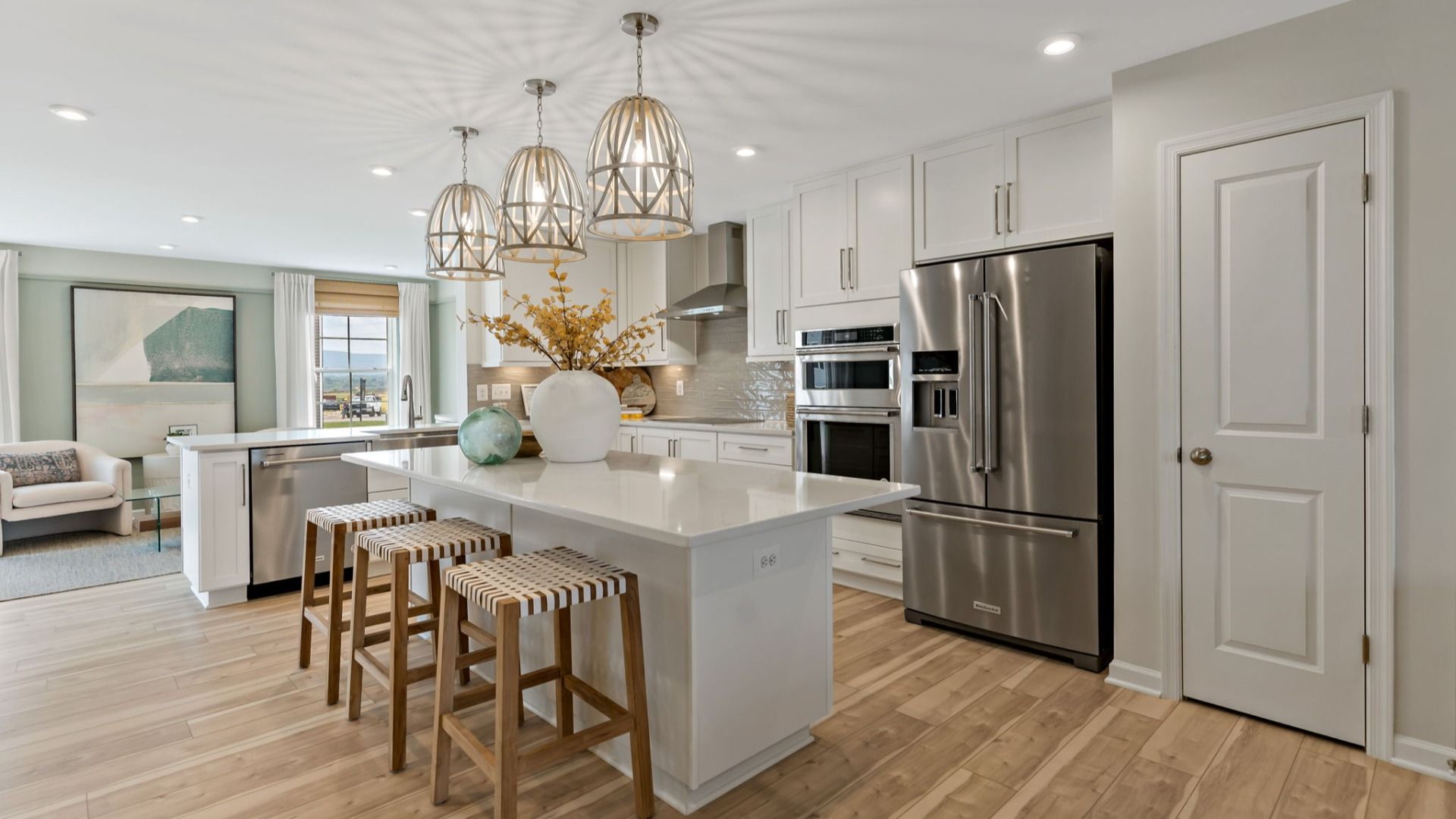 Cook and entertain in the Whitehall II kitchen with quartz countertops and a large island.