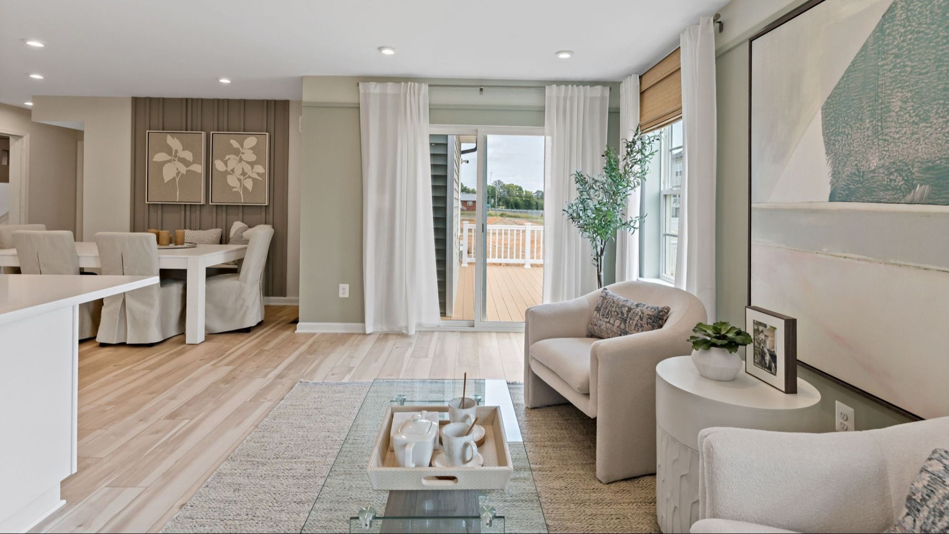 Entertain in the living area of the Whitehall II, featuring natural light and deck access.