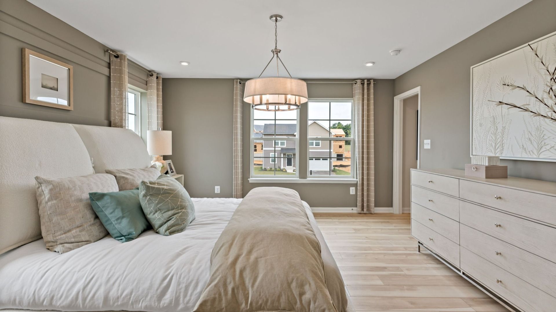 Relax in the Whitehall II owner’s suite, featuring stylish lighting and light-filled windows.