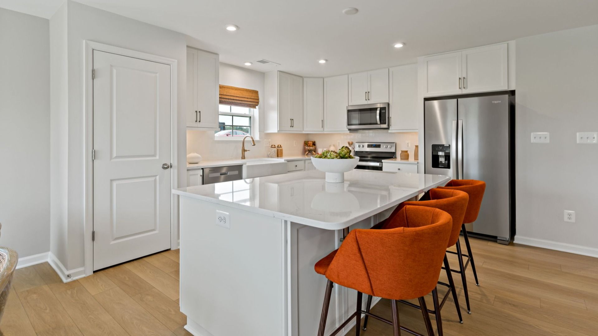 Enjoy cooking in the Edgewood II kitchen, featuring modern finishes and a spacious island.