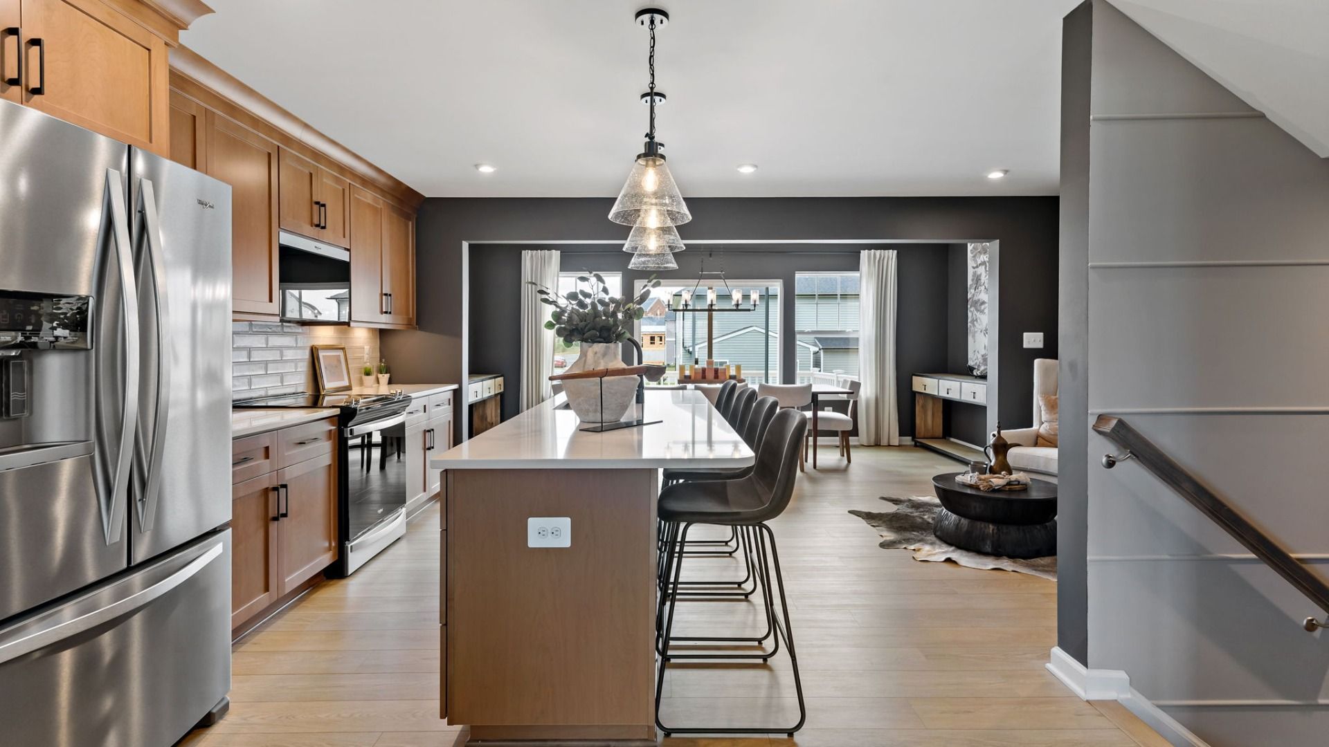 Spacious kitchen with stainless steel appliances and dining area in the York II Garage floor plan.