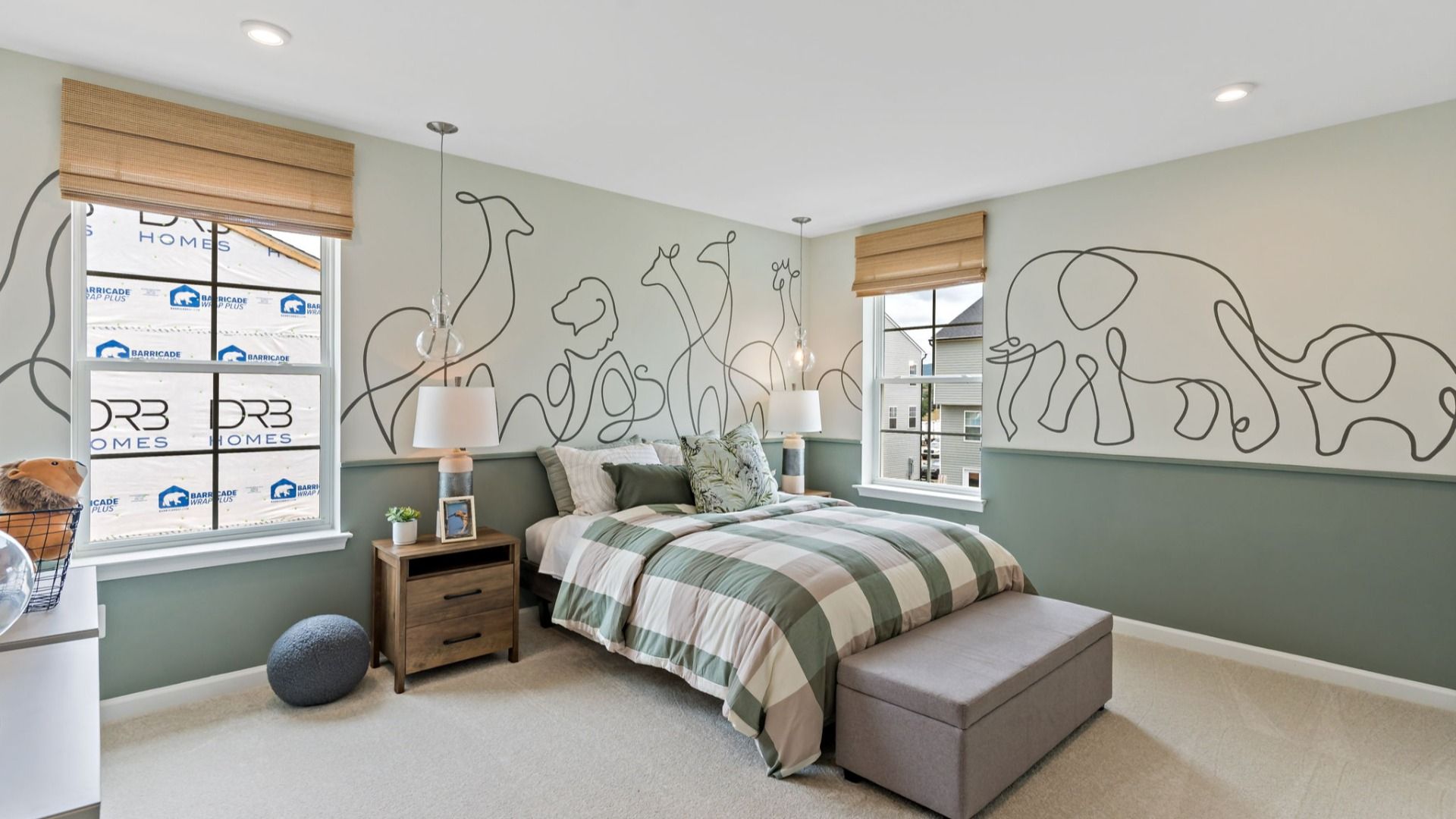 A fun and inviting second bedroom featuring cozy decor in the Whitehall II floorplan.