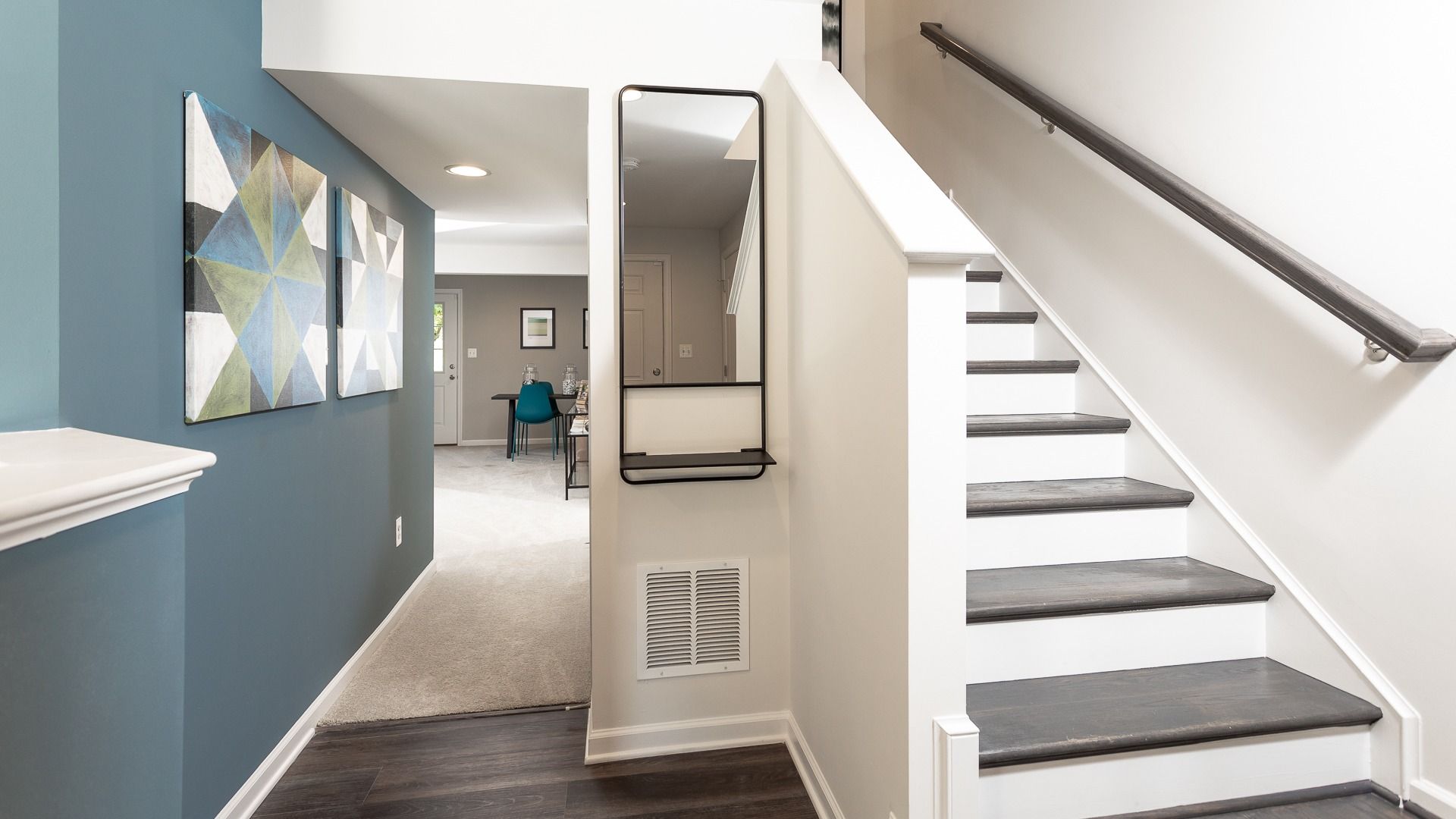 The York II lower level main entrance, offering access to versatile living and lounge spaces.