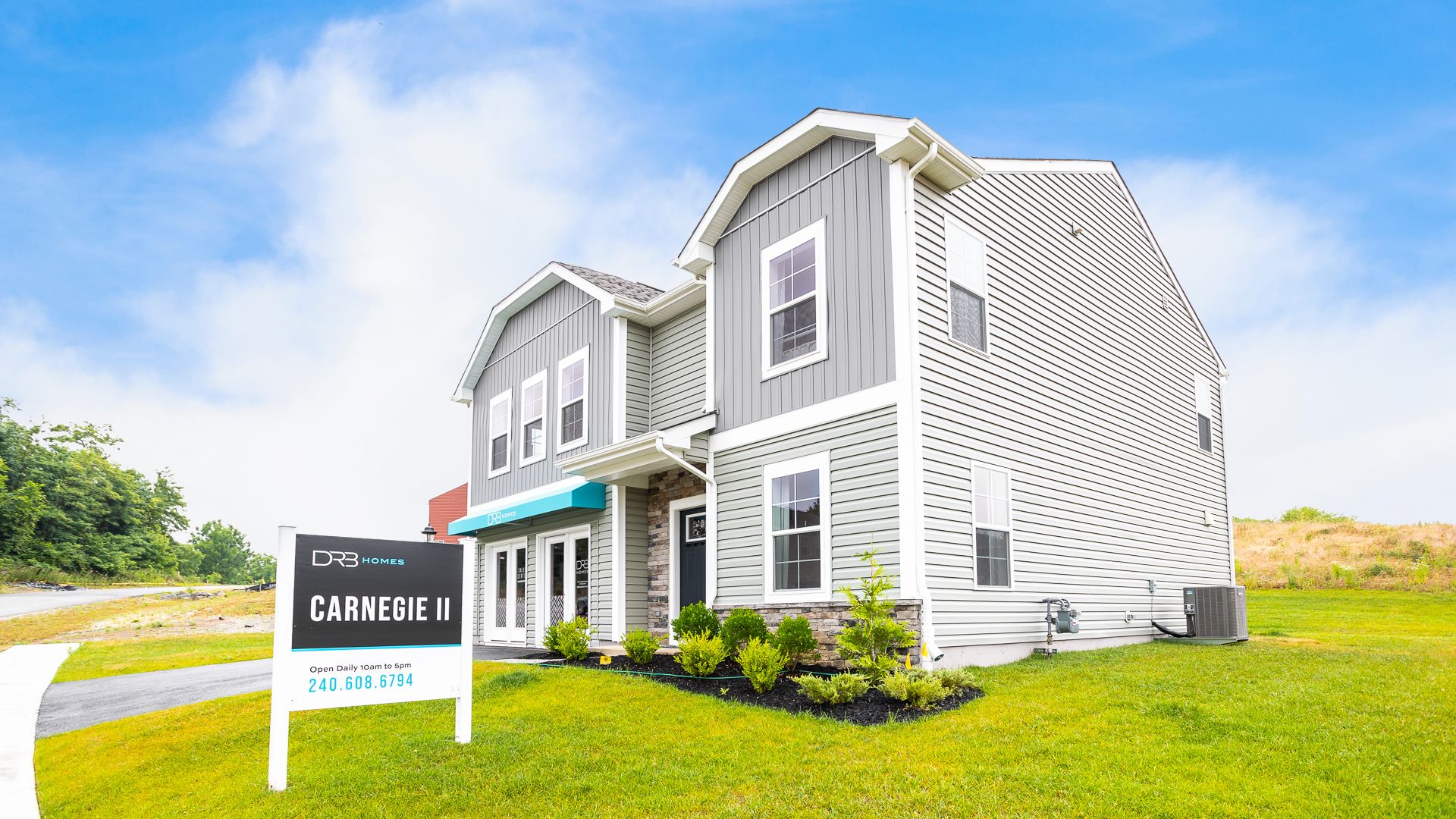 The Carnegie II at Chesterfield features a modern farmhouse design with spacious living.