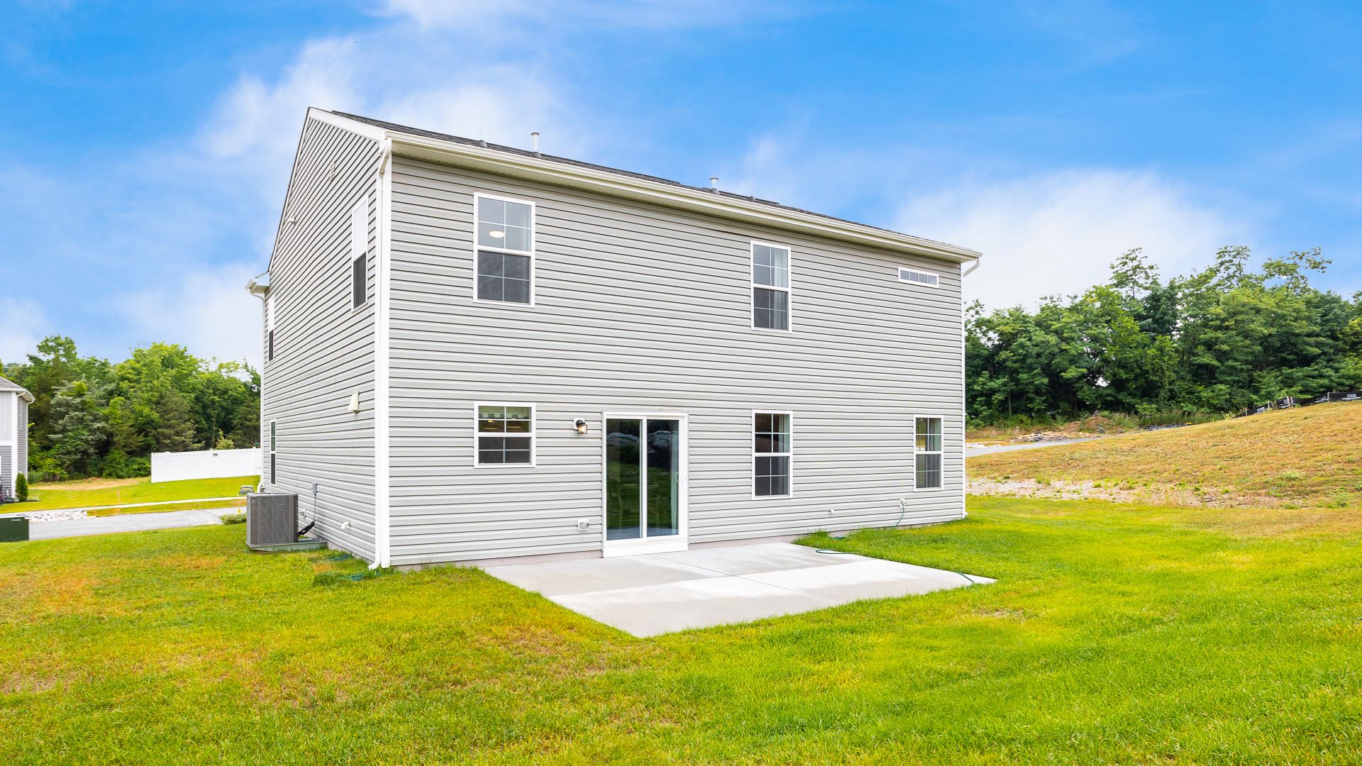 A spacious backyard in the Carnegie II floor plan is perfect for outdoor gatherings