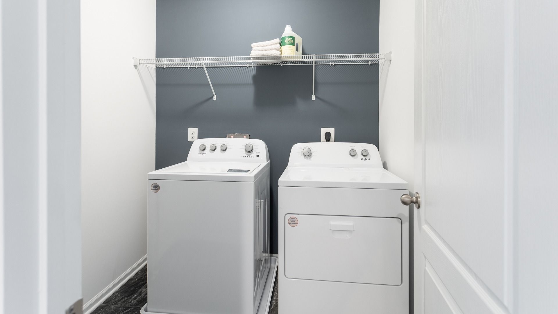 The laundry area in the Carnegie II offers a dedicated, functional space for household tasks.