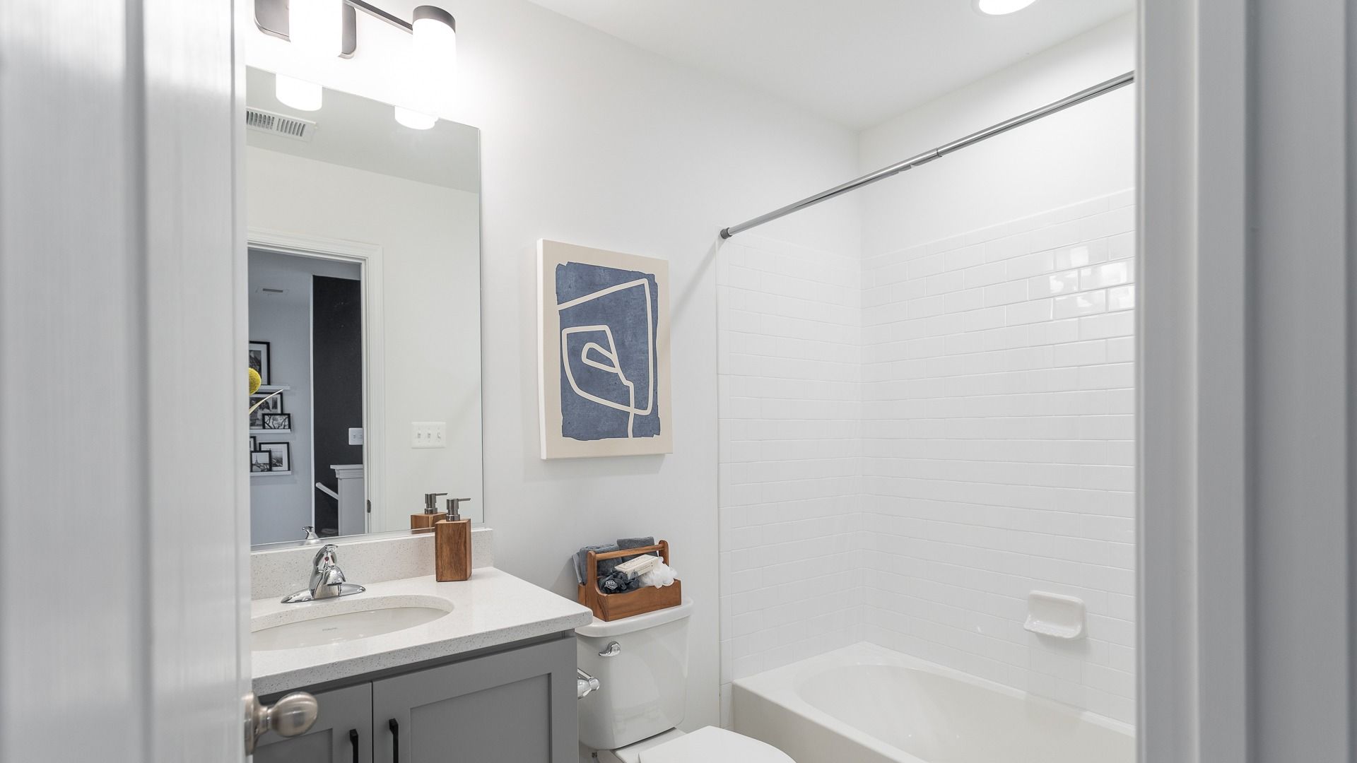 The hall bath in the Carnegie II is perfect for daily routines with soft lighting.