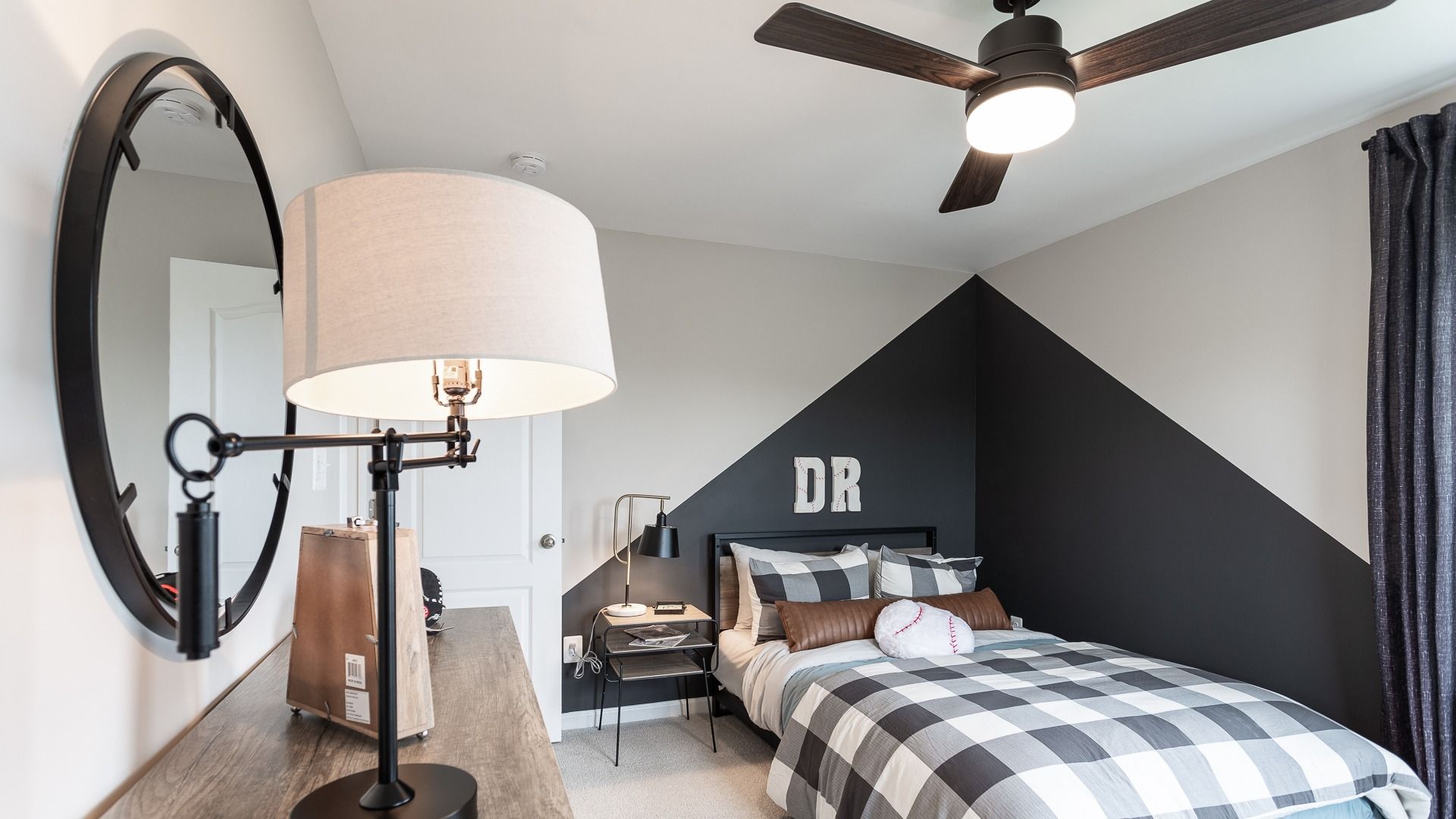 Modern bedroom in the Carnegie II offers a stylish space ready for personalized touches.