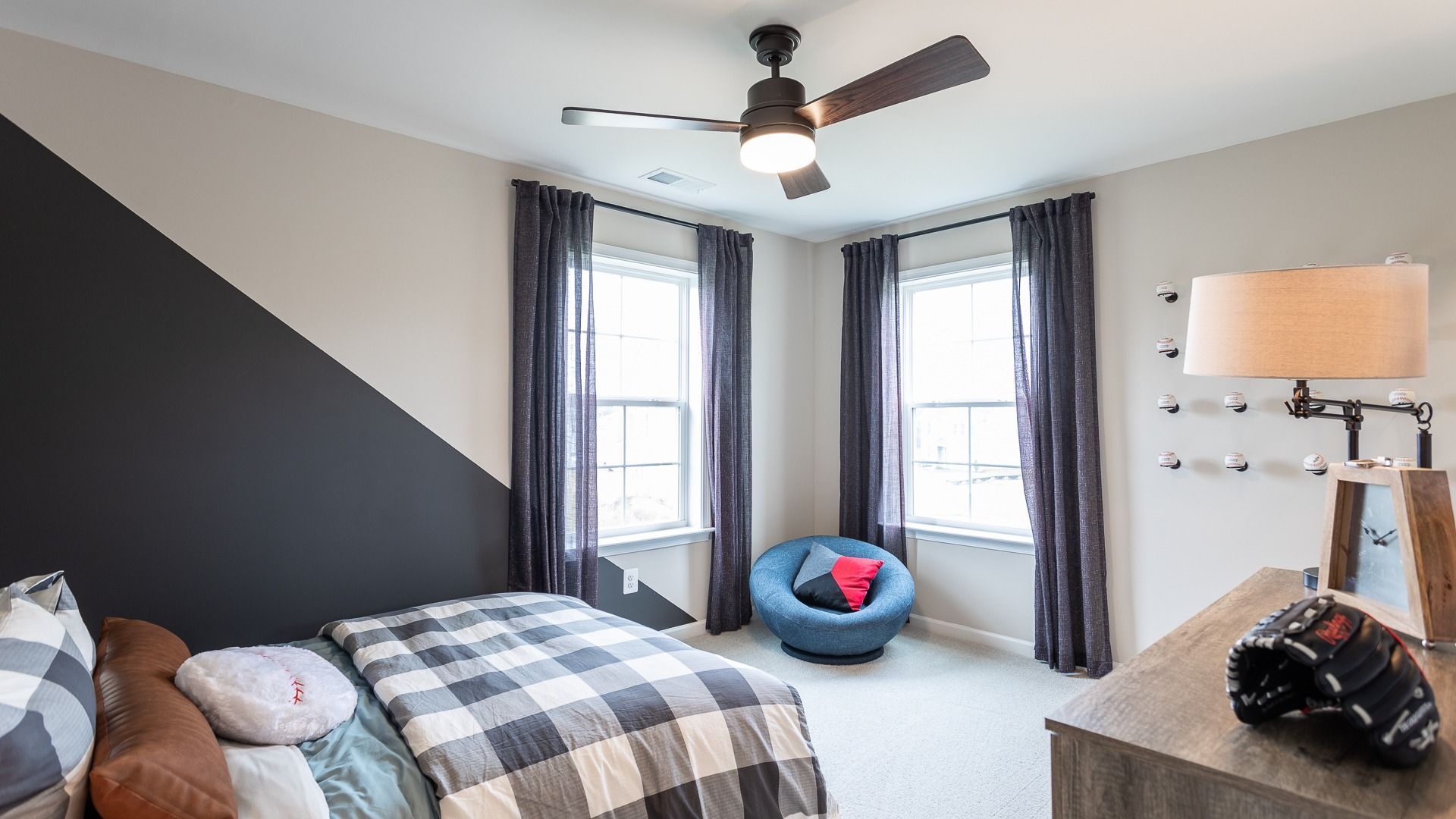 The third bedroom in the Carnegie II offers a fun space for personalized sports-themed decorating.