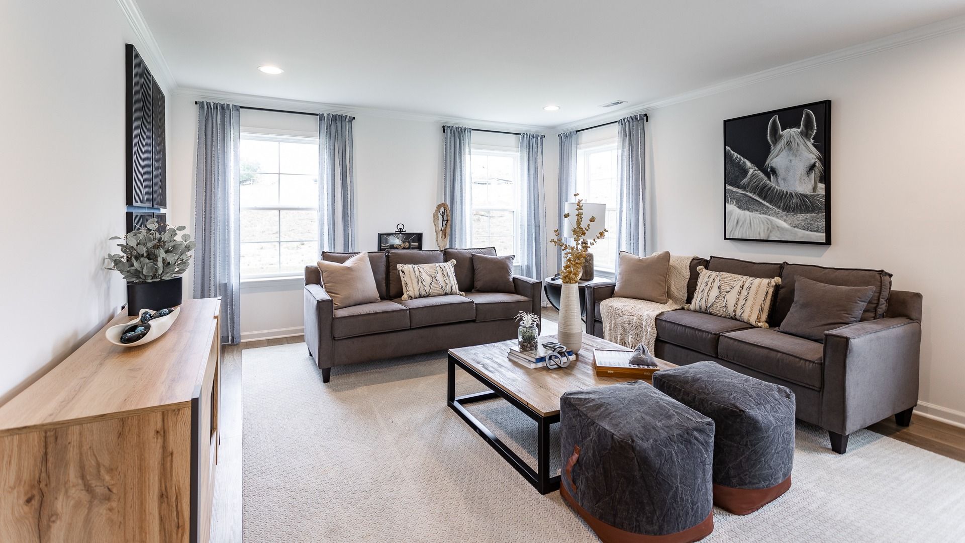 Cozy Carnegie II living room with warm tones and bright natural light.