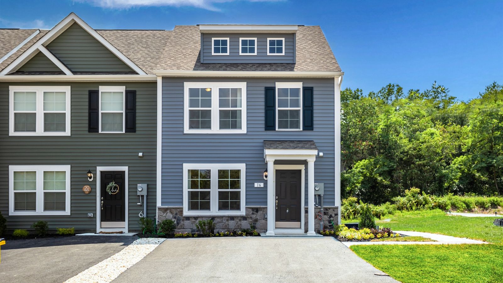 Madison II elevation 6 exterior featuring Pacific Blue siding and timeless curb appeal.